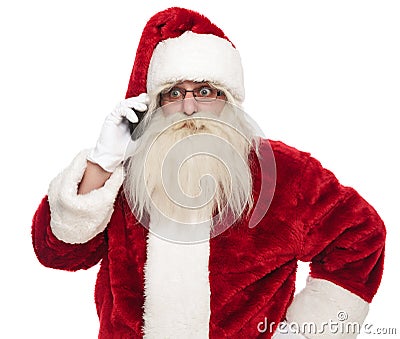Portrait of santa claus talking on the phone Stock Photo