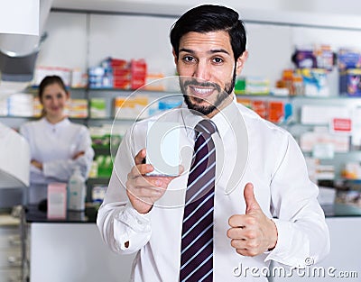 Satisfied man client in pharmacy Stock Photo