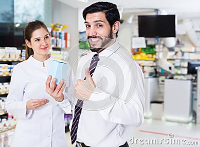 Satisfied man client in pharmacy Stock Photo