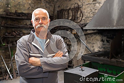 Portrait of senior metalworker Stock Photo