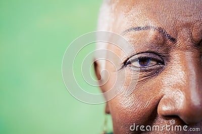 Portrait of senior woman, close-up of eye and face Stock Photo