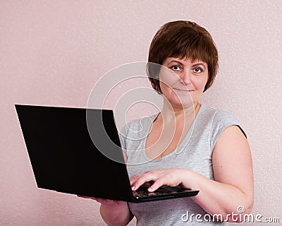 Portrait of senior woman with laptop Stock Photo