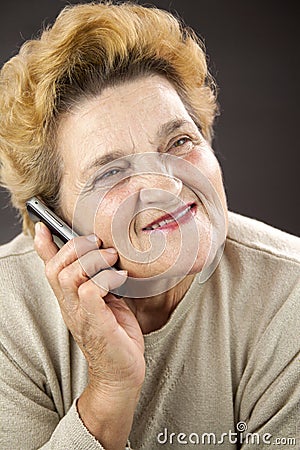 Portrait of senior woman takling on cellphone Stock Photo