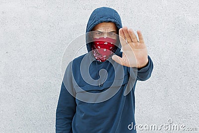 Portrait of serious disappointed protester against black citizens lawlessness,guy showing stop gesture with his palm, stop murder Stock Photo