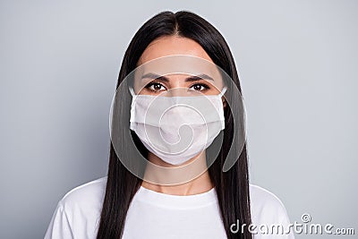 Portrait of serious girl corona virus infection patient want stop bio danger bacteria spreading wear medical mask Stock Photo