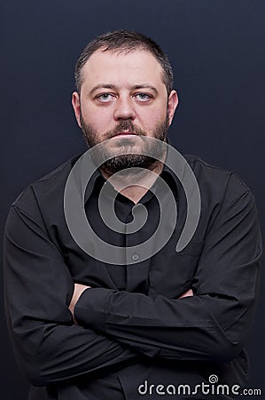 Portrait of serious man with black shirt Stock Photo