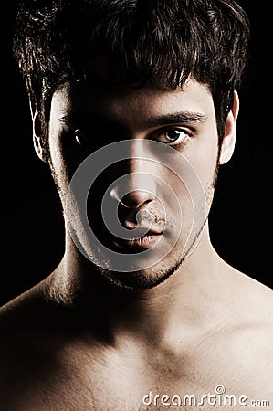 Portrait of serious unshaven man Stock Photo