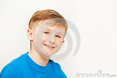 Portrait of seven years old boy in blue t-shirt Stock Photo