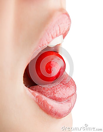 Portrait of mouth eating cherry Stock Photo