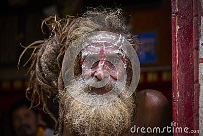 Portrait of Shaiva sadhu, holy man in Pashupatinath Temple, Kathmandu. Nepal Editorial Stock Photo