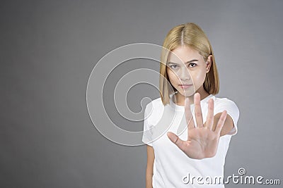 Portrait of short blonde hair woman in studio Stock Photo