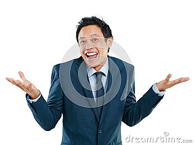 Portrait, shrug and excited with a business asian man in studio isolated on a white background for promotion. Comic Stock Photo