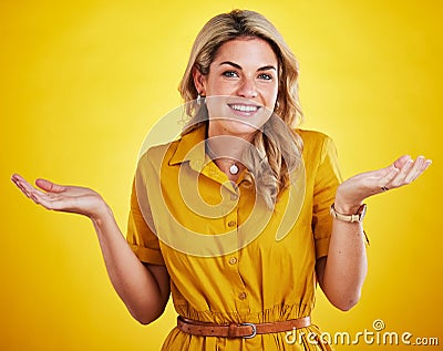 Portrait, shrug and woman with a smile, confused and decision with lady against studio background. Face, female model Stock Photo