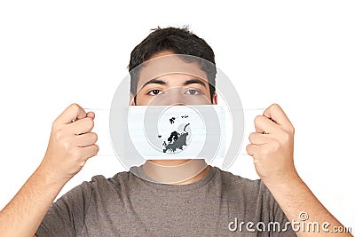 Portrait of a man protecting his face with a medical mask Stock Photo