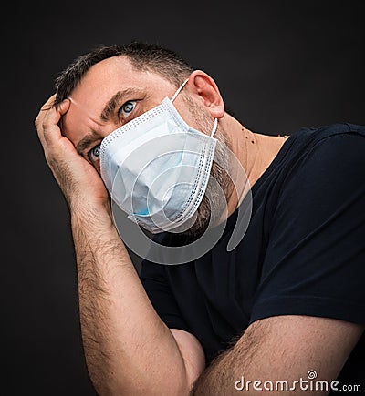 Sick old man in medical mask Stock Photo