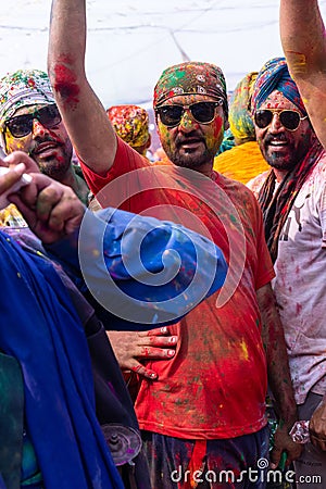 Portrait of sikh people with colorful turban and colours of face during hola mohalla Editorial Stock Photo