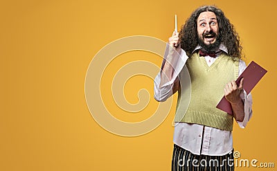 Portrait of a skinny nerd holding a pen and notepad - idea concept Stock Photo