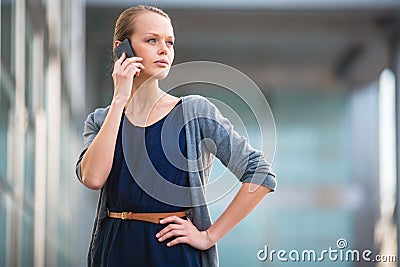 Portrait of a sleek young woman calling on a smartphone Stock Photo