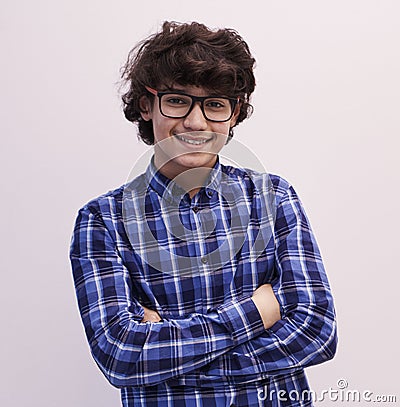 Portrait of smart looking arab teenager with glasses Stock Photo