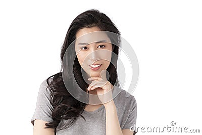 Portrait of a smiling Asian business woman looking at camera isolated over white background. Happy Young Asian Woman with blank co Stock Photo