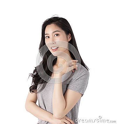 Portrait of a smiling Asian business woman looking at camera isolated over white background. Happy Young Asian Woman with blank co Stock Photo