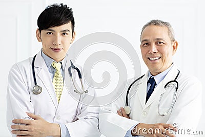 Portrait of smiling asian doctors Stock Photo