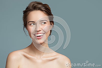 Portrait of smiling beautiful woman. Perfect skin. Stock Photo