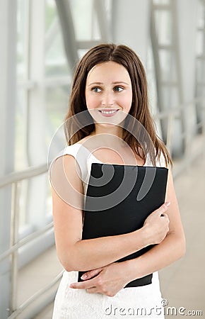 Portrait of smiling beautiful young businesswoman Stock Photo