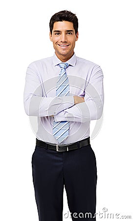 Portrait Of Smiling Businessman With Arms Crossed Stock Photo