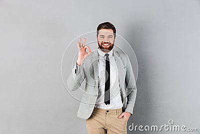 Portrait of a smiling businessman dressed in suit Stock Photo