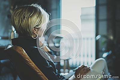 Portrait of smiling businesswoman talking with partner on smartphone device while working remotely in business travel Stock Photo