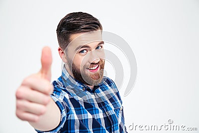 Portrait of a smiling casual man showing thumb up Stock Photo