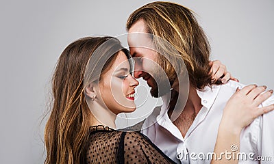 Portrait of smiling couple. Love. Sensuality. Happy cute lovers embracing. Stock Photo
