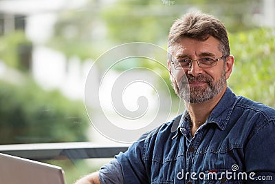 Portrait of smiling elderly man are smiling Stock Photo