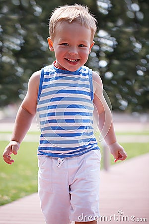 Portrait of smiling happy boy Stock Photo