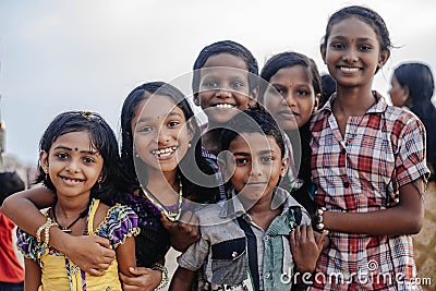 Portrait smiling indian children on Varkala during puja ceremony Editorial Stock Photo