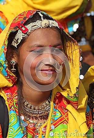 Portrait of smiling Indian girl at Pushkar camel fair Editorial Stock Photo