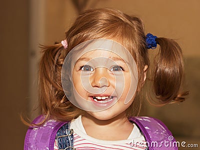 Portrait of a smiling liitle girl close-up Stock Photo