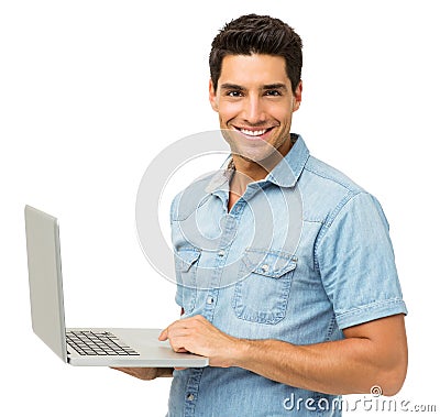 Portrait Of Smiling Man With Laptop Stock Photo