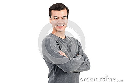 Portrait of smiling man wearing casual t-shirt, crossing arms Stock Photo