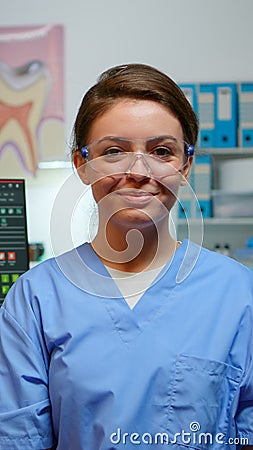 Portrait of smiling nurse in dental office Stock Photo