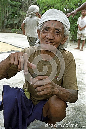 Portrait of smiling senior Filipino woman Editorial Stock Photo