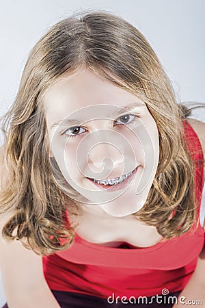 Portrait of Smiling Teenager Girl With Oral Teeth Dental Correct Stock Photo