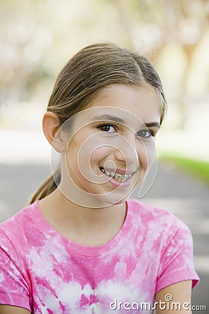 Portrait of Smiling Tween Girl Stock Photo