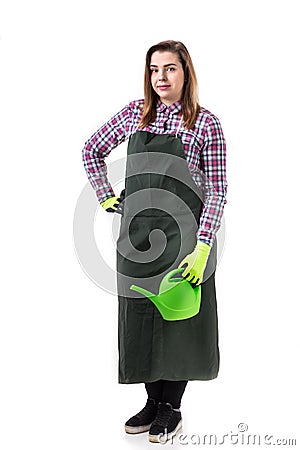 Portrait of smiling woman professional gardener or florist in apron holding gardening tools isolated on white background Stock Photo