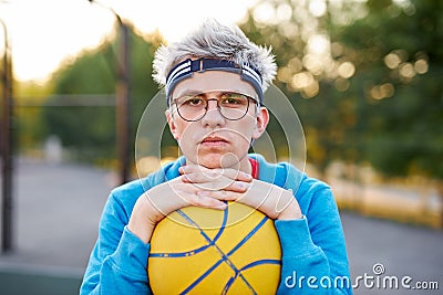 Portrait of sportsman young boy with ball Stock Photo
