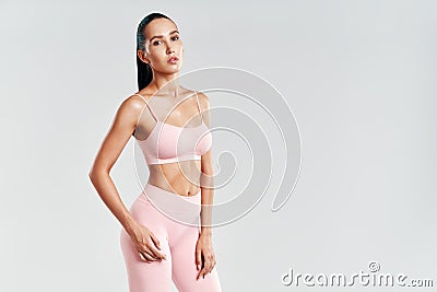 Portrait of sporty fitness woman in sportswear with copy space Stock Photo