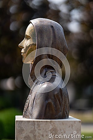 Portrait of the statue of Satoshi Nakamoto mysterious founder of Bitcoin Editorial Stock Photo