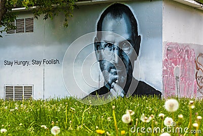 Portrait of Steve Jobs made in the wall of a building Editorial Stock Photo