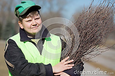 Portrait street sweeper in city park Stock Photo